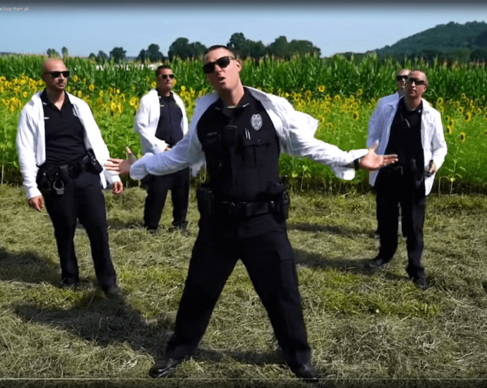 Police lip-sync music videos